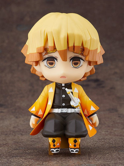 Nendoroid 102 Zenitsu Agatsuma seated with yellow to orange hair and haori over black uniform