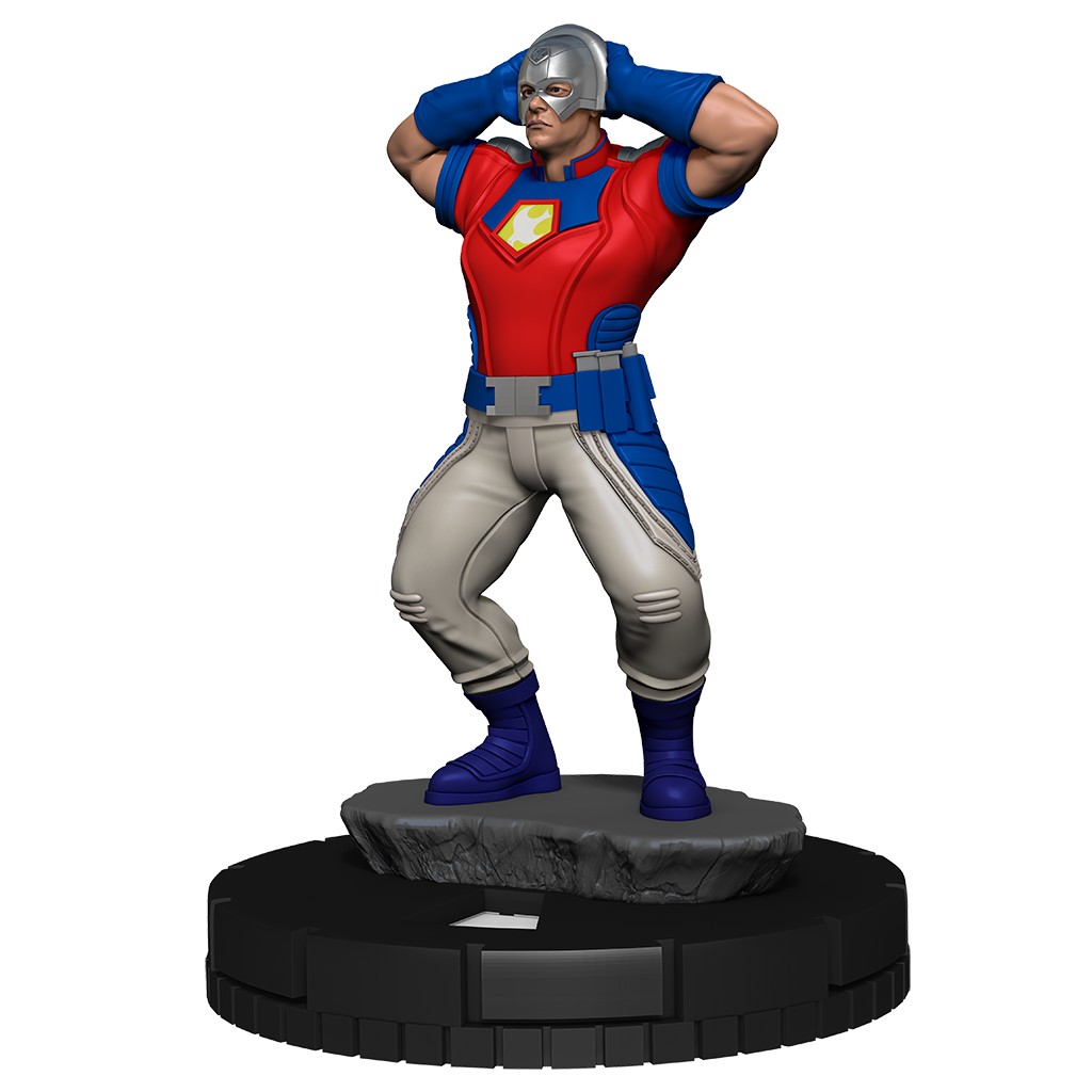 Peacemaker miniature in red, blue, and white costume with silver helmet, hands behind head.