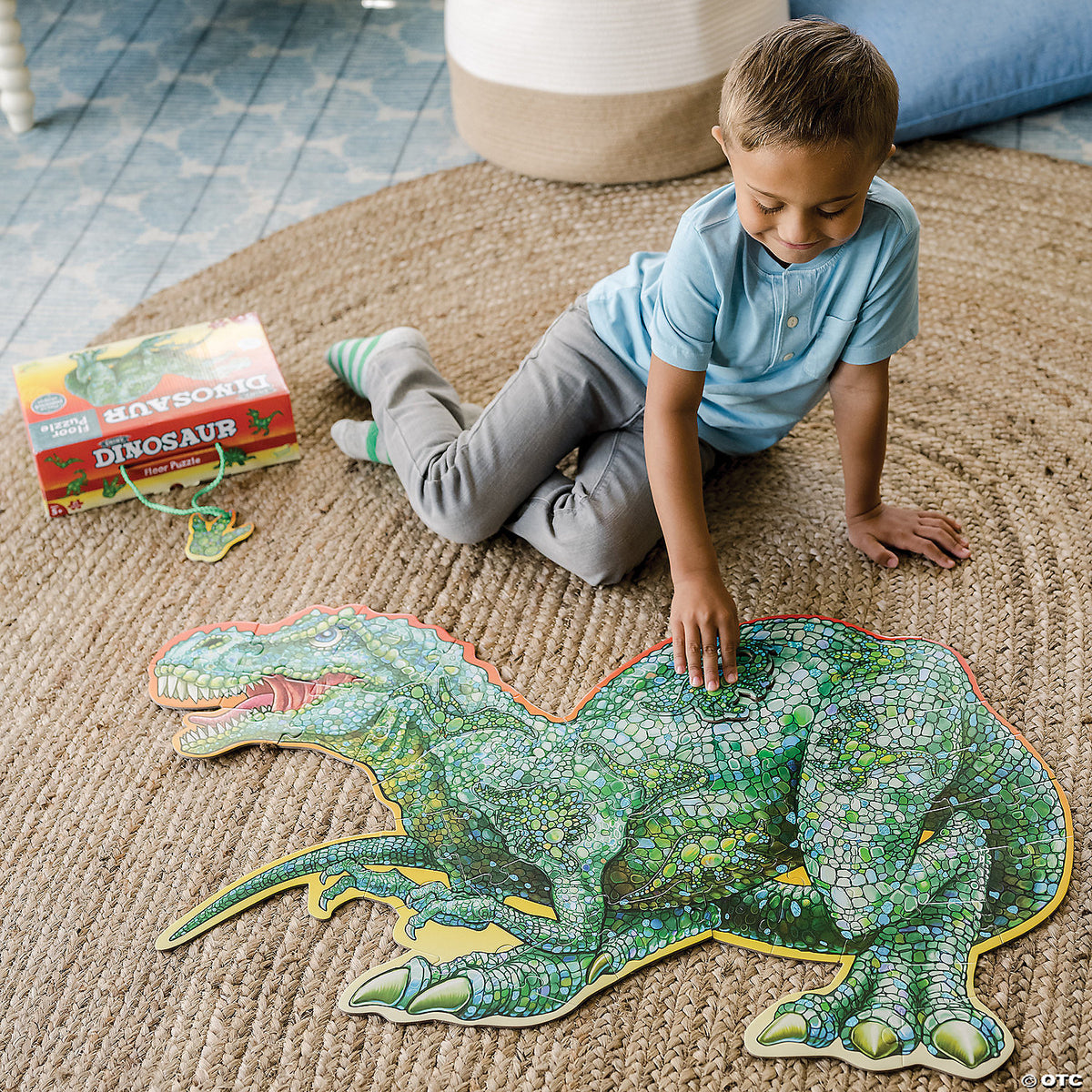 Dinosaur floor puzzle partially assembled showing vibrant cartoon artwork