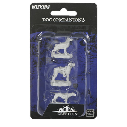 WizKids Dog Companions blister pack with three unpainted grey miniature dog figures, one with a saddle