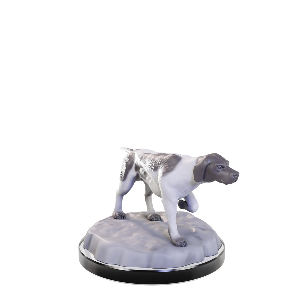 White and brown hunting dog figurine in a pointing stance, one front paw raised, on a round base
