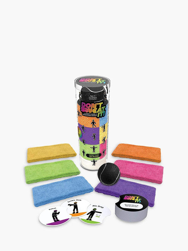Don&#39;t Sweat It party game with sweatbands ball and game cards spread out
