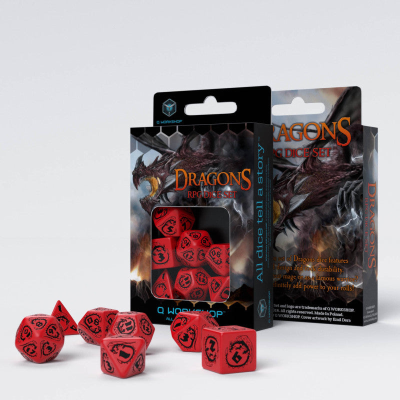 Red polyhedral &quot;DRAGONS RPG DICE SET&quot; with black dragon symbols, spilled from its box featuring a large dragon illustration