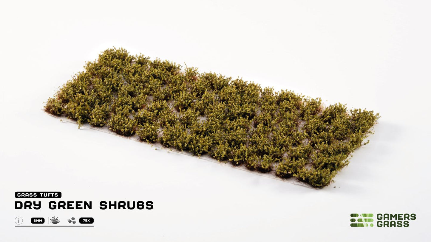 Dry green miniature shrub tufts on a sheet for tabletop terrain modeling