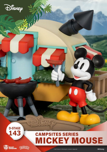 Close-up of Mickey Mouse figure smiling with campfire accessories