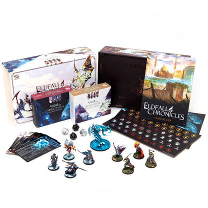 Eldfall Chronicles board game set with boxes, fantasy miniatures, dice, cards, and tokens