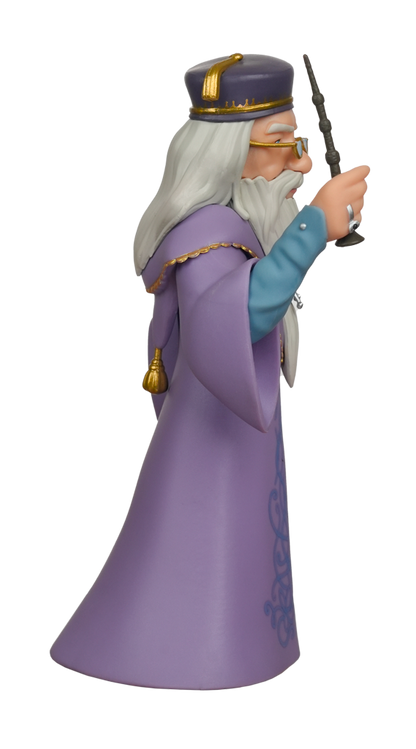 A MINIX Harry Potter Albus Dumbledore Figure in profile wears a purple robe with gold trim and holds a dark wand