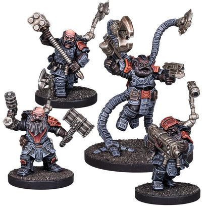 Four armored sci-fi dwarven miniatures with various weapons including hammers, axes, and guns, One features robotic arms