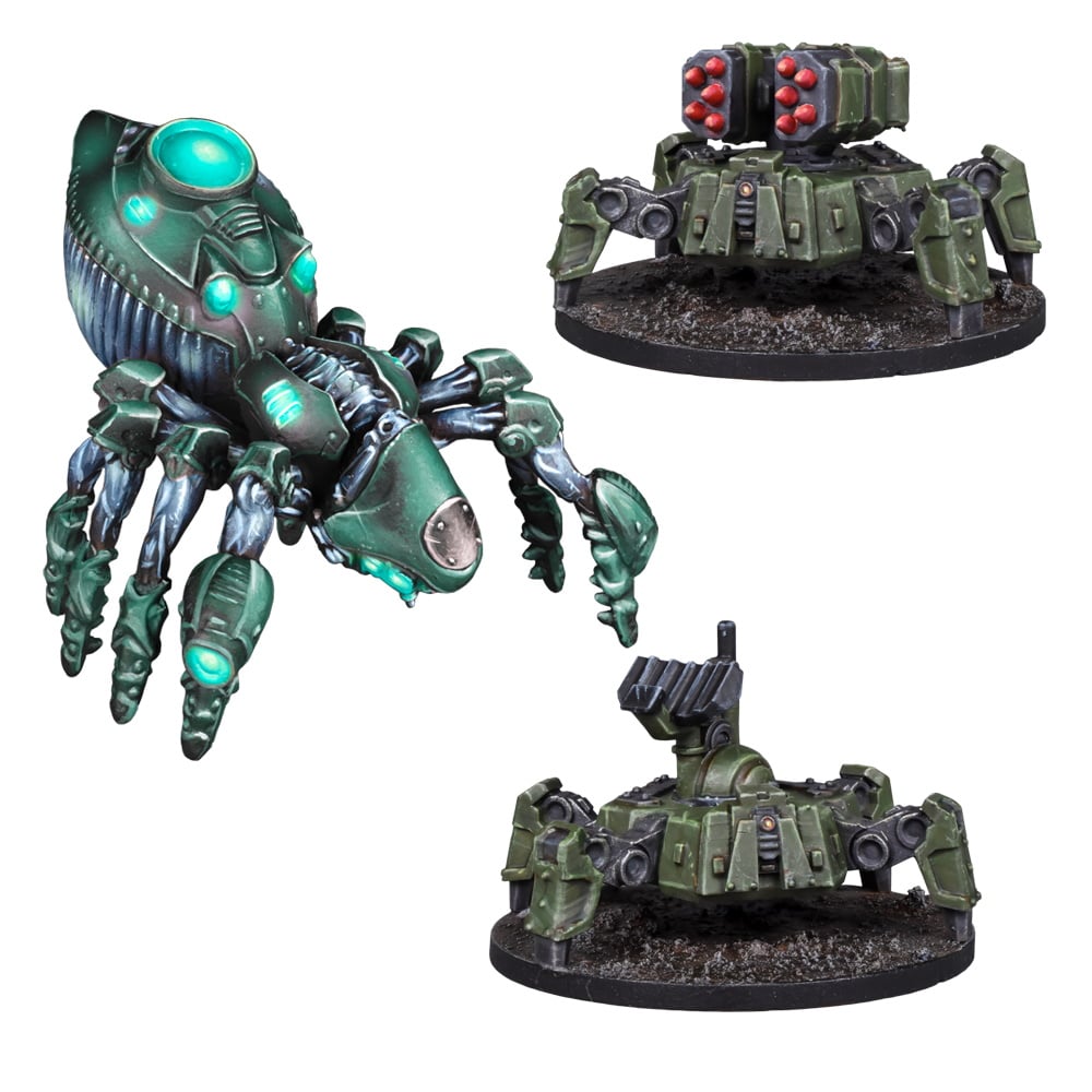 A large green robotic spider with glowing lights stands beside two smaller olive-green four-legged turret models, one with missiles