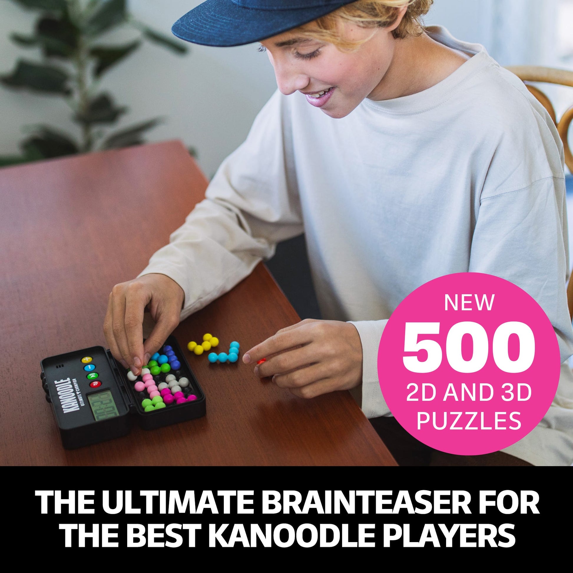 Young person playing Kanoodle puzzle game, arranging colourful interlocking bead pieces inside the black travel case