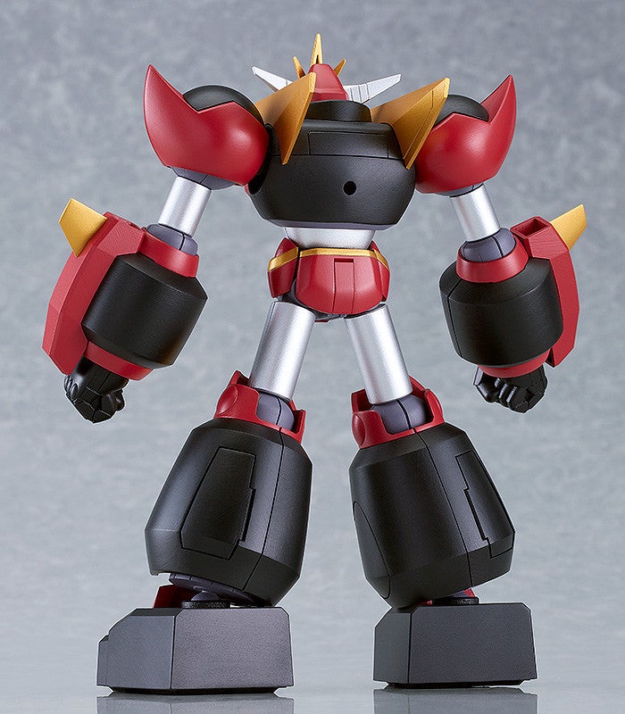 Moderoid Dai-Guard action figure in striking red black and gold standing on display base rear view