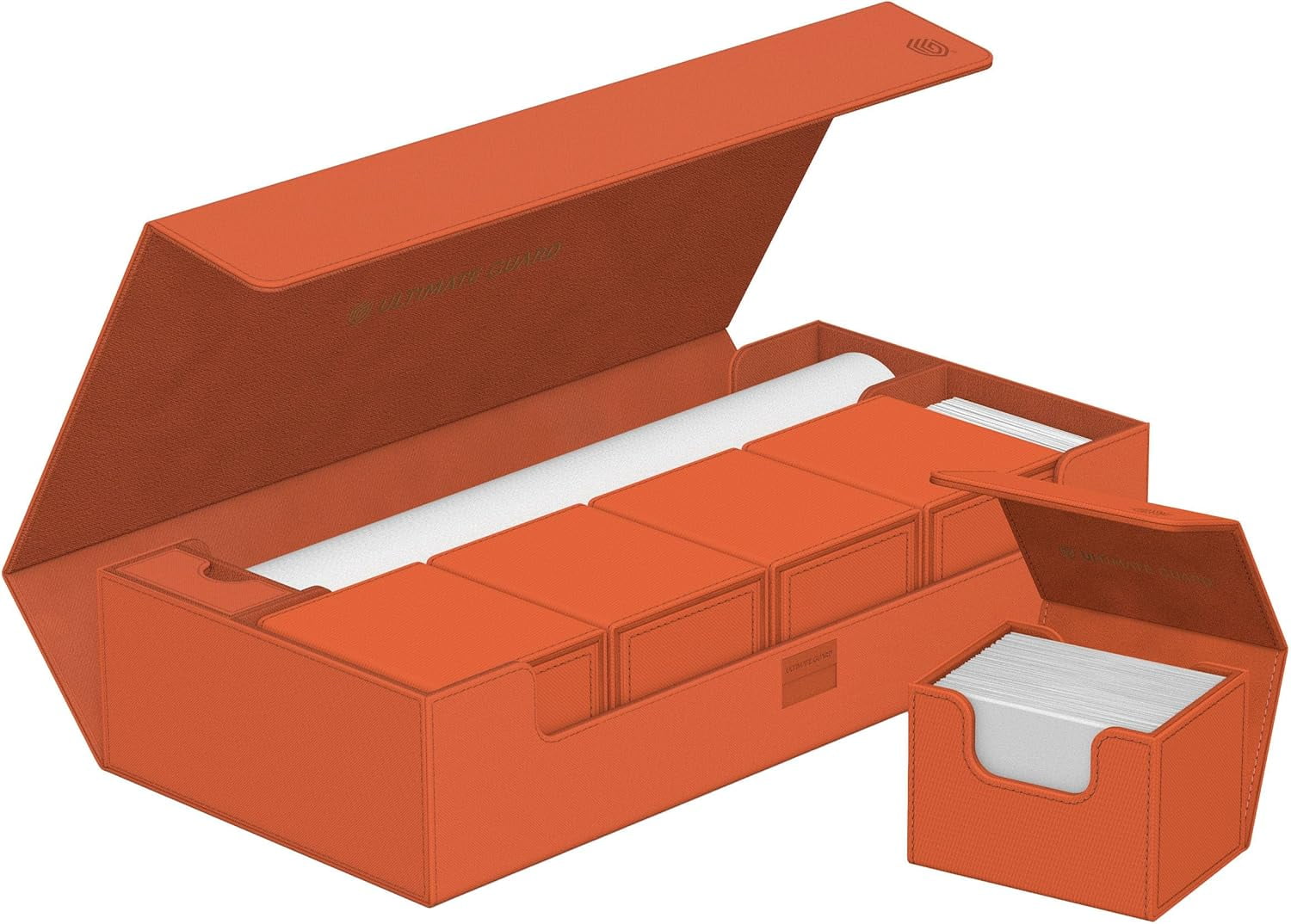 Open peach modular storage box holding four deck boxes and a rolled playmat. One small box is removed with cards