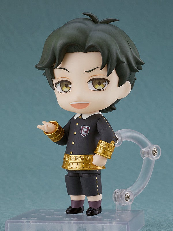 Damian Desmond Nendoroid Figure in his black school uniform with gold trim and purple accents standing on a clear display base