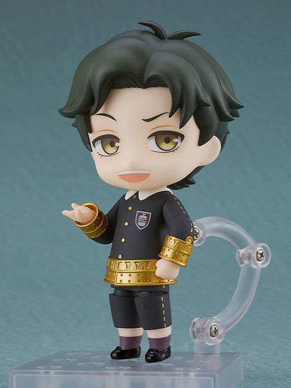 Damian Desmond Nendoroid Figure in his black school uniform with gold trim and purple accents standing on a clear display base