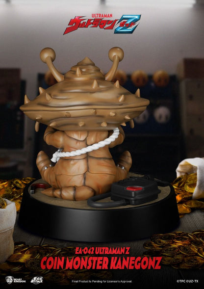 Brown coin monster Kanegon collectible figure with spiky shell and gold coins on a dark base