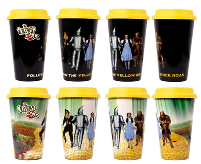 Eight Wizard of Oz travel mugs with yellow lids, featuring Dorothy and friends on the Yellow Brick Road