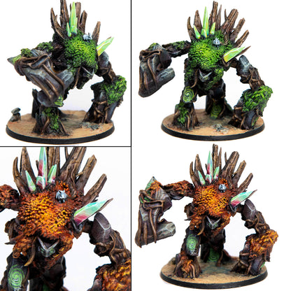 Two variants of a miniature treant or elemental: one green mossy, one orange textured, both with crystal spines, on sandy bases.