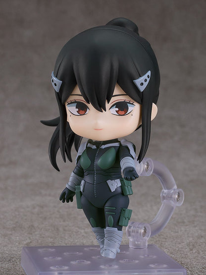 Close-up of determined face, aiming her weapon with visible cheek marks and raised eyebrows