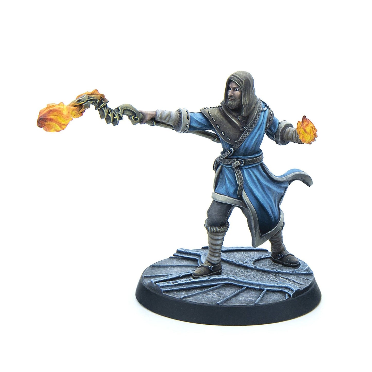 Bearded wizard miniature in blue robe casts fire from staff and hand