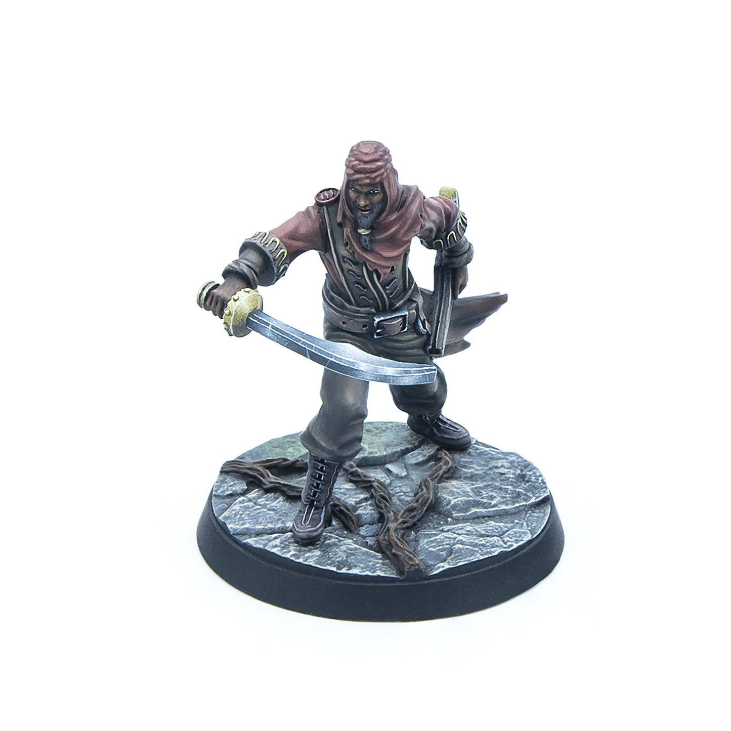 Painted miniature of a dark-skinned warrior with a turban and beard, lunging with a scimitar on a rocky base