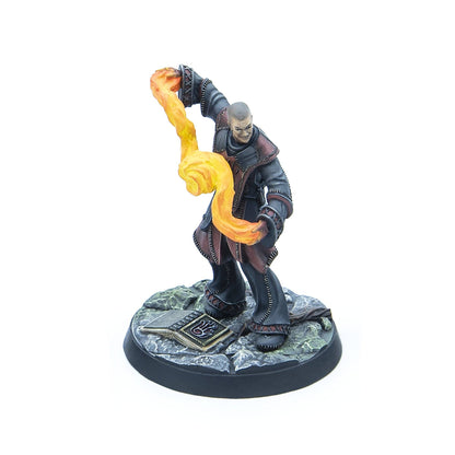 Painted miniature of a bald wizard in dark robes, smirking while casting an orange fire spell