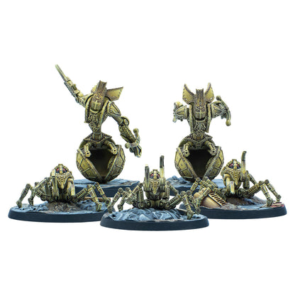 Six gold robot miniatures on rocky bases. Two humanoids emerge from spheres; four spider-like robots crawl