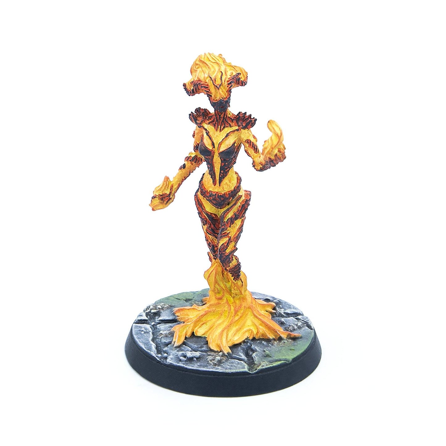 A painted miniature of a yellow and orange swirling fire elemental on a textured grey base