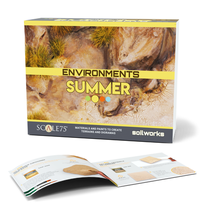 Scale 75 Soilworks Scenery Environments Summer Set box, featuring a dry, rocky landscape with grass, is presented with an open instructional booklet for diorama creation