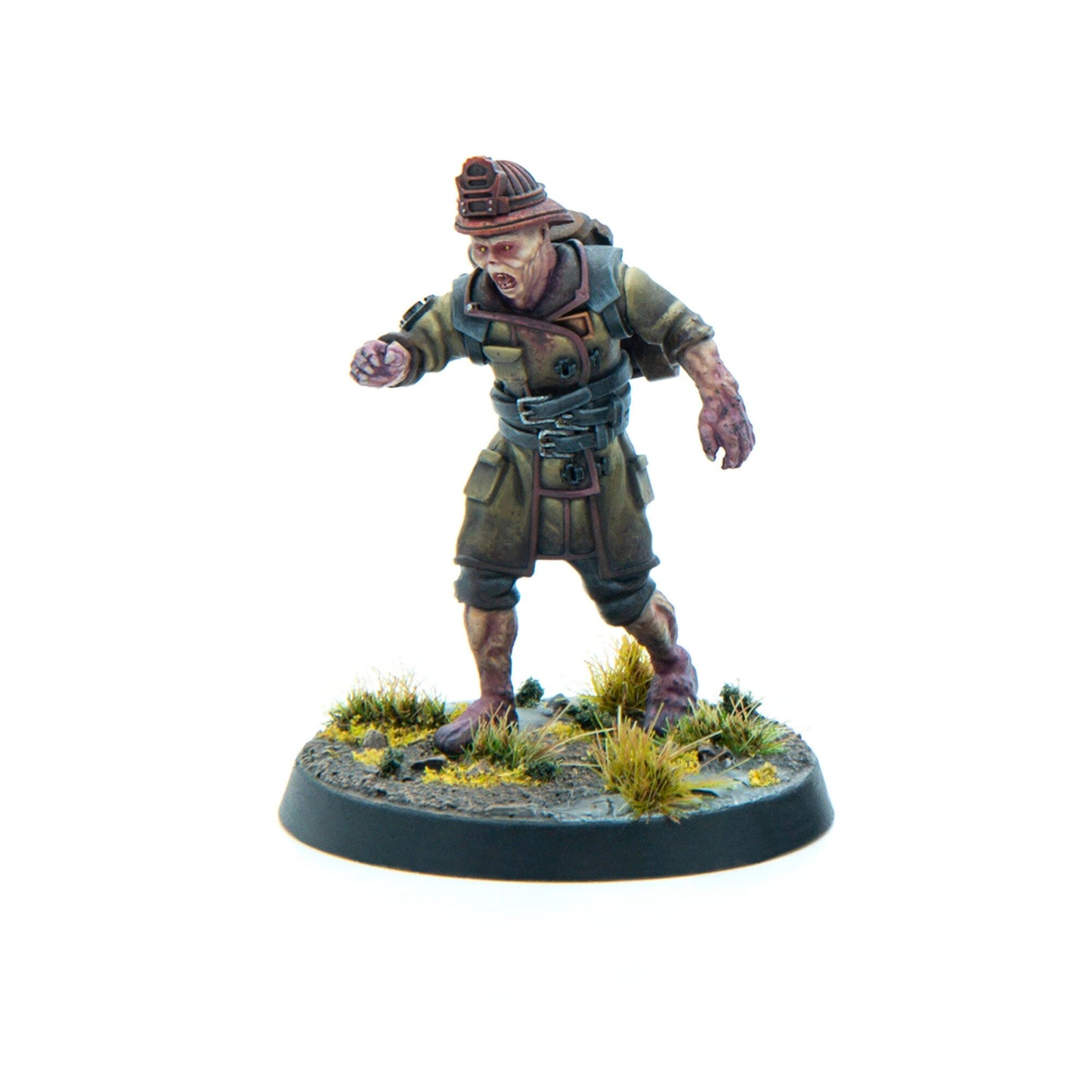 A miniature of a zombified miner in an olive uniform and hard hat, lunging forward with an open mouth