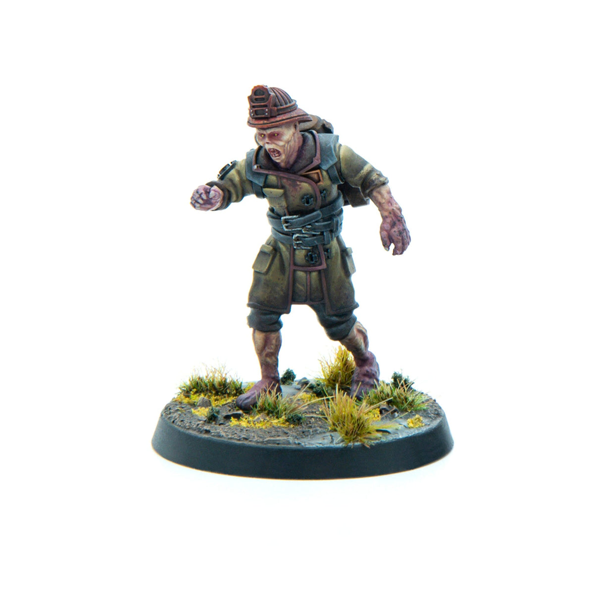 A miniature of a zombified miner in an olive uniform and hard hat, lunging forward with an open mouth
