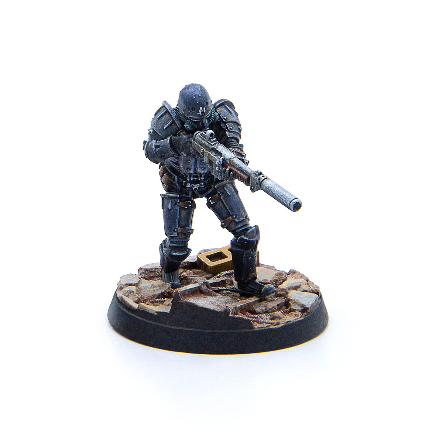 A painted miniature figure from Fallout Wasteland Warfare Brotherhood of Steel Combat Patrol featuring an armored soldier holding a rifle standing on a textured base