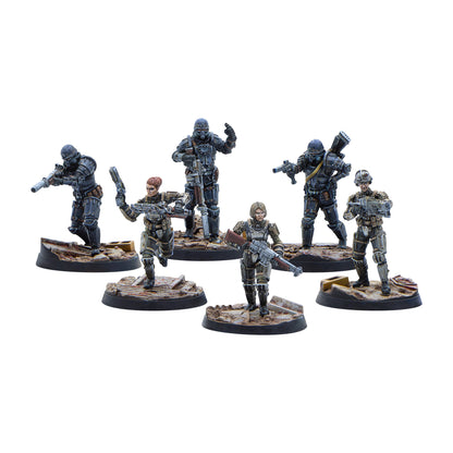 Six miniature wargame figures, some in armored suits and gas masks, holding various firearms on textured bases