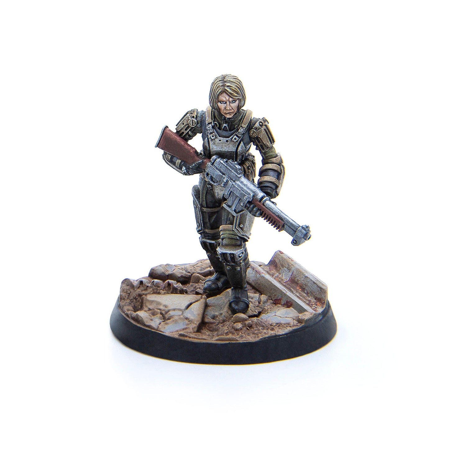 A miniature female soldier in grey and brown power armor holds a large rifle, standing on a rocky base against a white background
