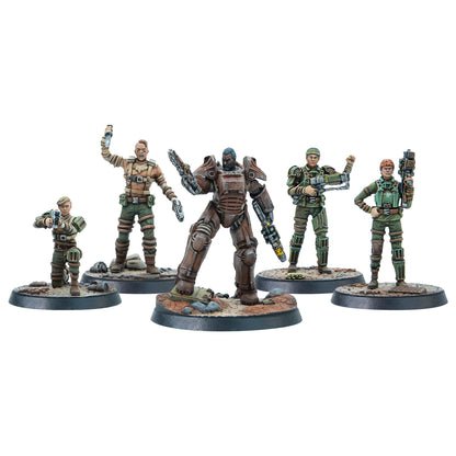 Five detailed miniatures: a central power-armored figure wielding two guns, flanked by four armed human soldiers