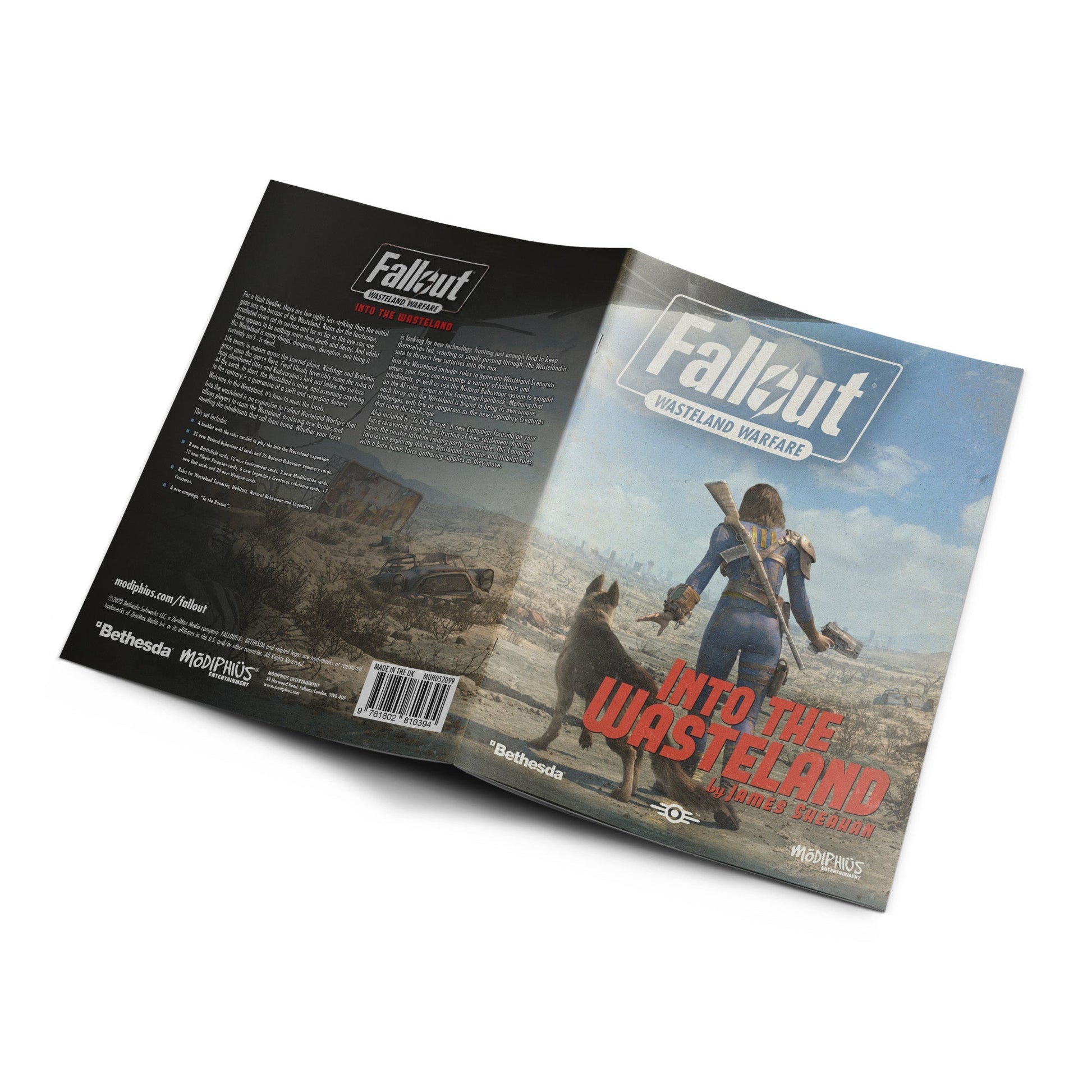 Fallout Wasteland Warfare booklet cover showing a Vault Dweller and dog facing a desolate wasteland