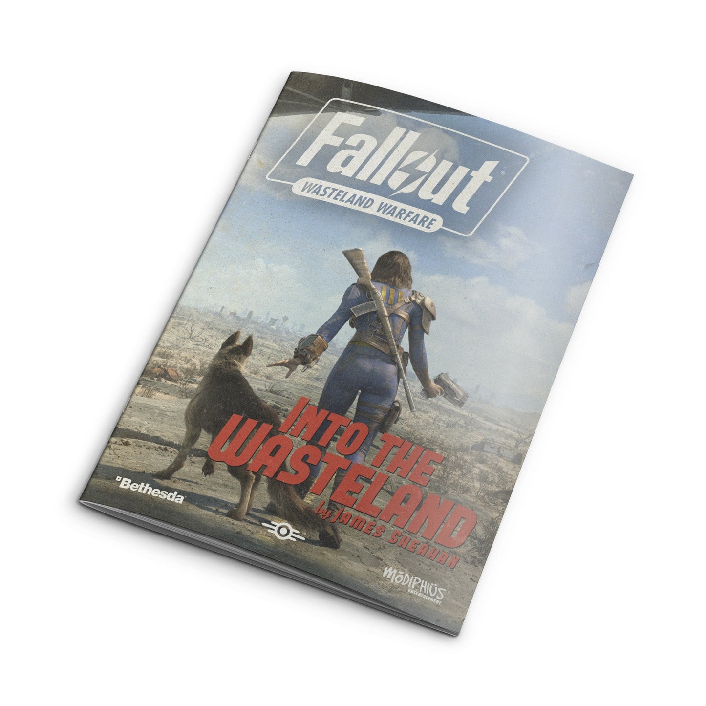 Fallout: Wasteland Warfare booklet cover shows a female Vault Dweller and her dog looking out at a ruined cityscape