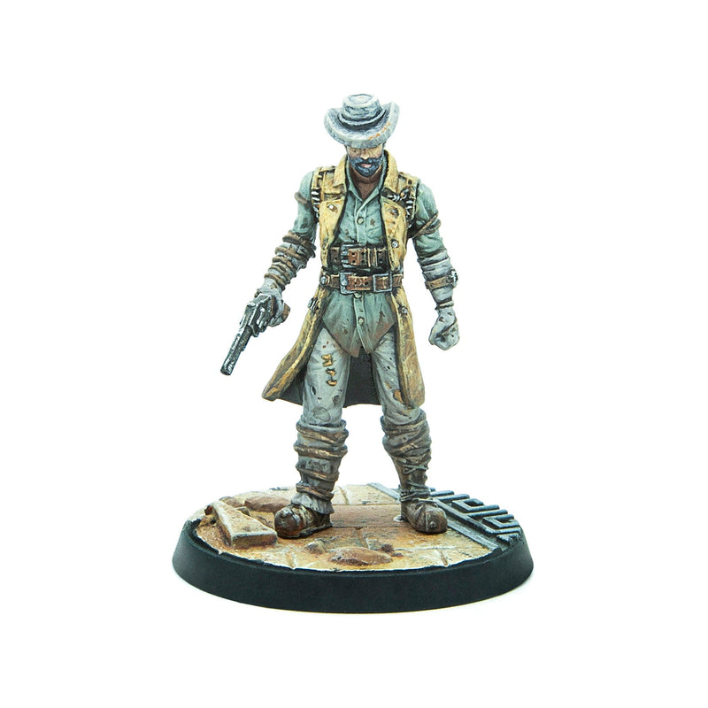 Painted miniature: A man in a duster coat and hat, holding a pistol, standing on a gritty wasteland base