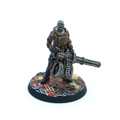 Miniature: dark-skinned woman with blue hair and brown coat, wielding a large gatling gun on a broken brick base
