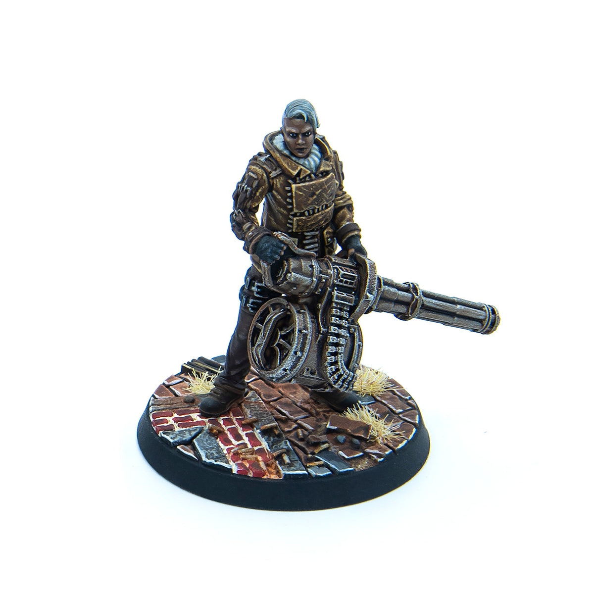 Miniature: dark-skinned woman with blue hair and brown coat, wielding a large gatling gun on a broken brick base