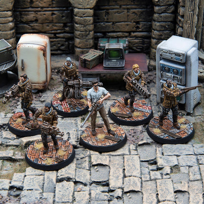 Six armed miniature figures in a post-apocalyptic scene - one has a sniper rifle, others wield heavy weapons