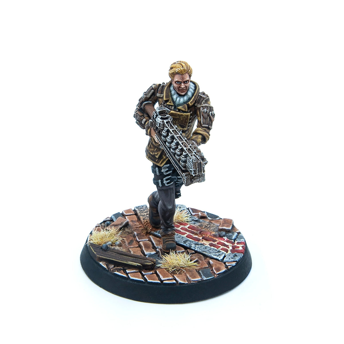 Painted miniature of a blonde woman in brown jacket, running with a multi-chambered weapon on a ruined street base