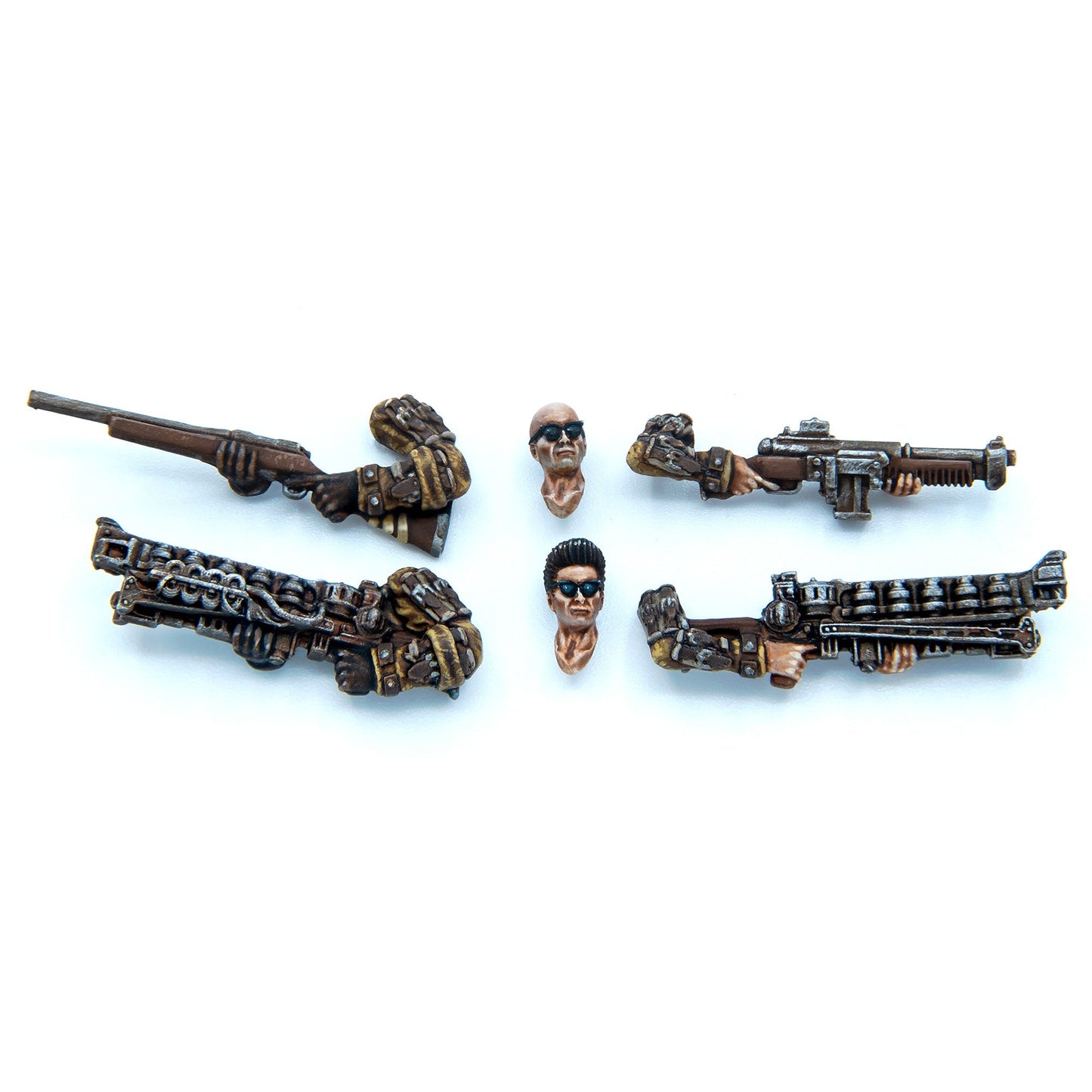 Wargaming miniature parts: two heads with sunglasses, four pairs of arms holding various firearms
