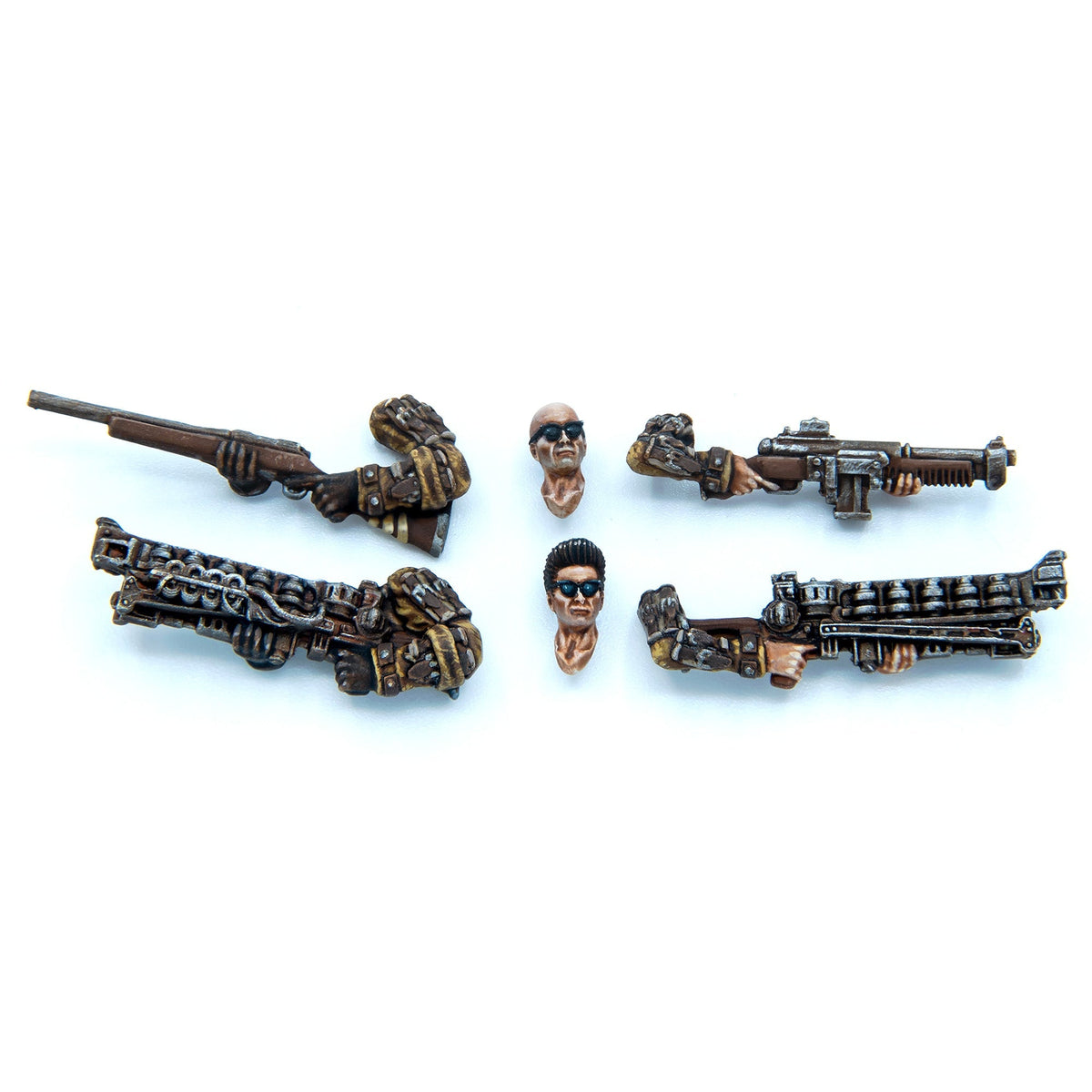 Wargaming miniature parts: two heads with sunglasses, four pairs of arms holding various firearms
