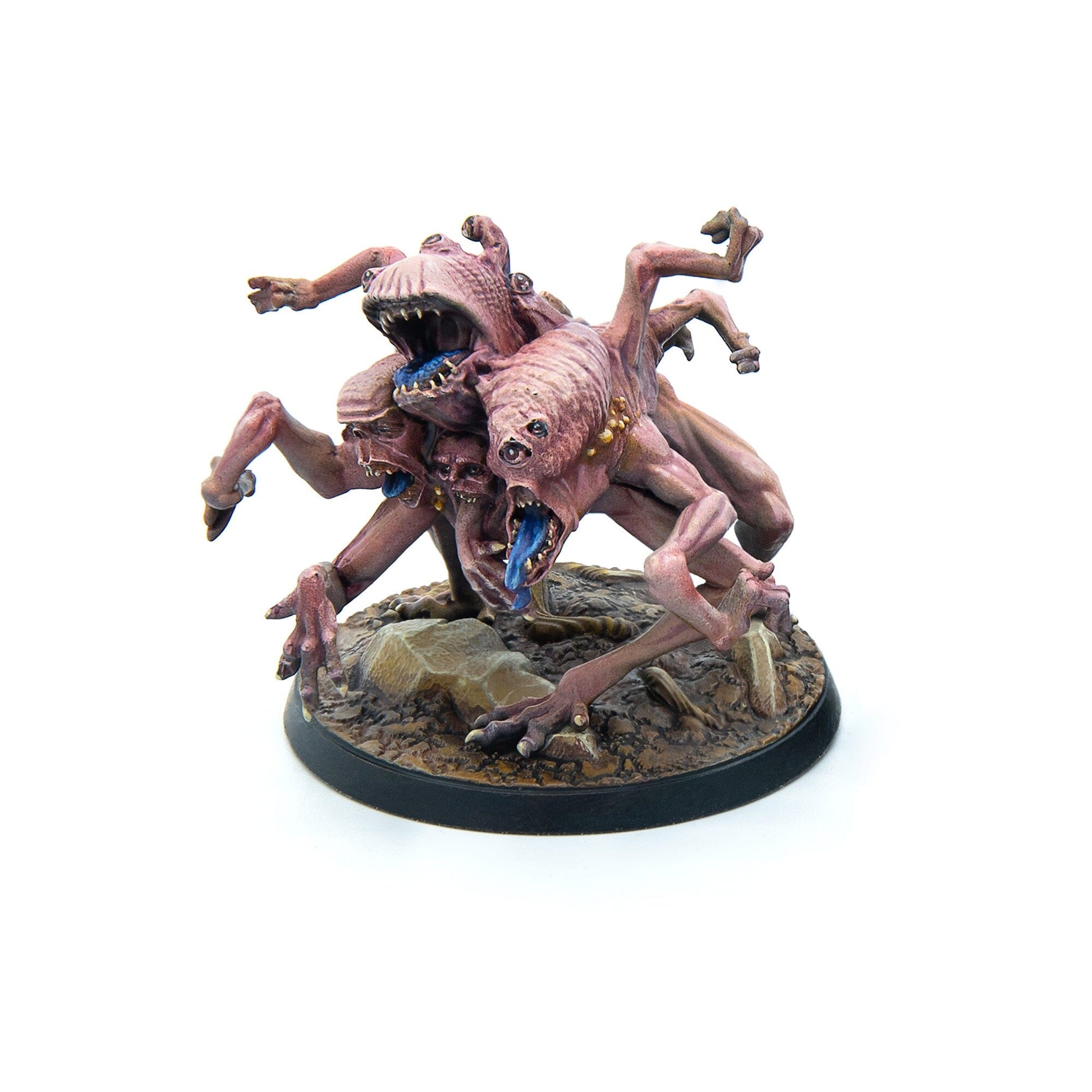 A multi-headed, multi-limbed pinkish-red monster miniature with blue tongues stands on a rocky base