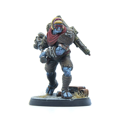 A painted miniature of a blue-skinned brute wearing heart-shaped glasses, holding a two-headed club and carrying a heavy weapon