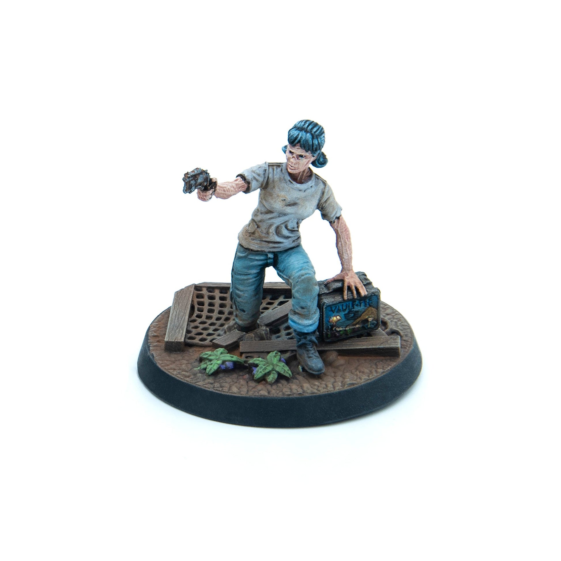 Miniature of a woman with blue hair, dirty clothes, aiming a pistol, leaning on a crate on a broken sewer grate base