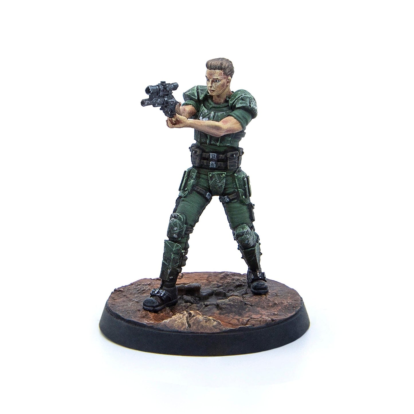 A painted miniature of a male soldier in green armored uniform, aiming a sci-fi rifle, standing on a textured base