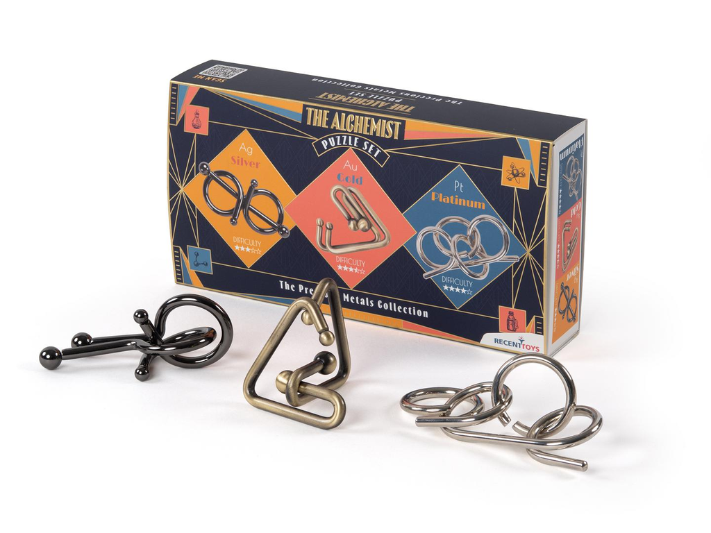 Three different metal disentanglement puzzles next to The Alchemist Puzzle Set box