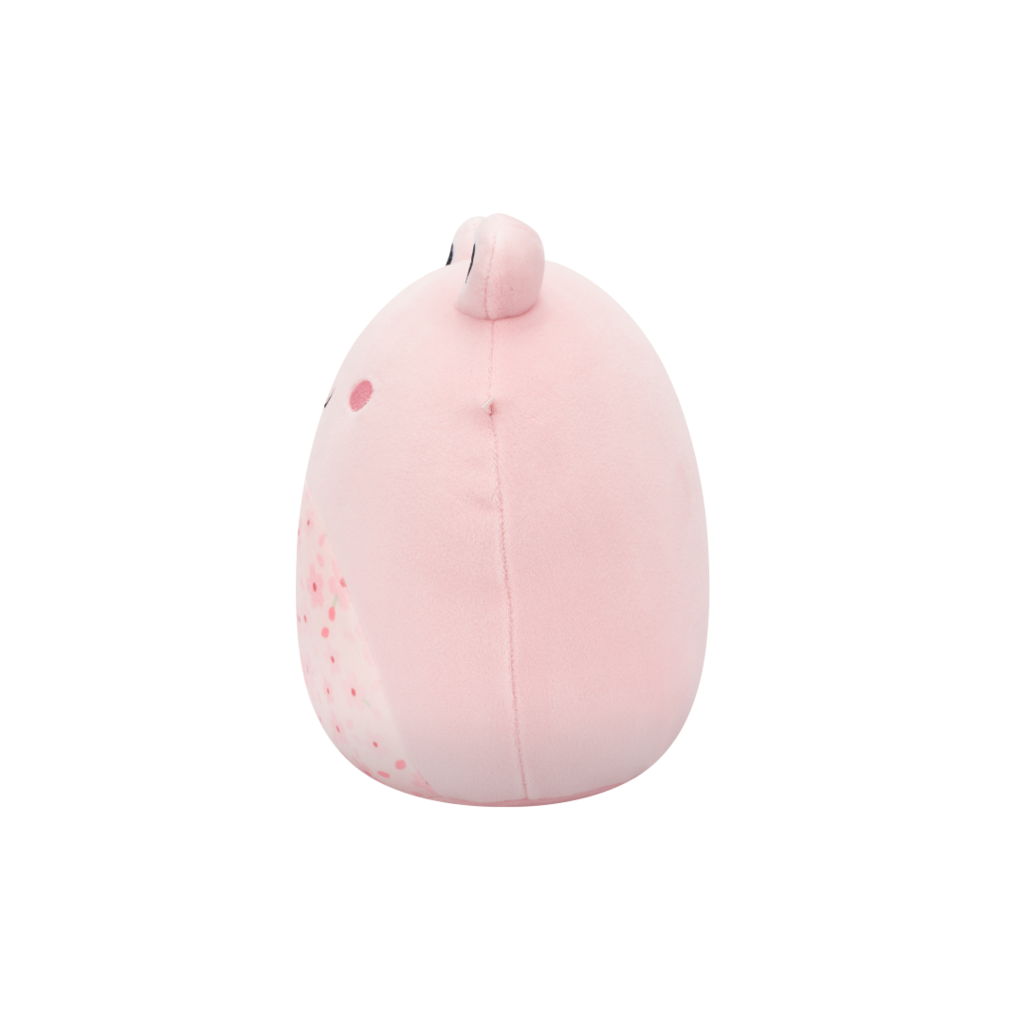 Side view of a round, soft pink plush toy with a small ear and a speckled cherry blossom pattern on its side