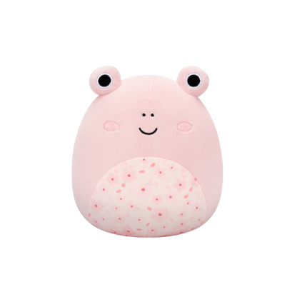 Pink Squishmallow frog plush with a cherry blossom patterned belly, smiling on a black background